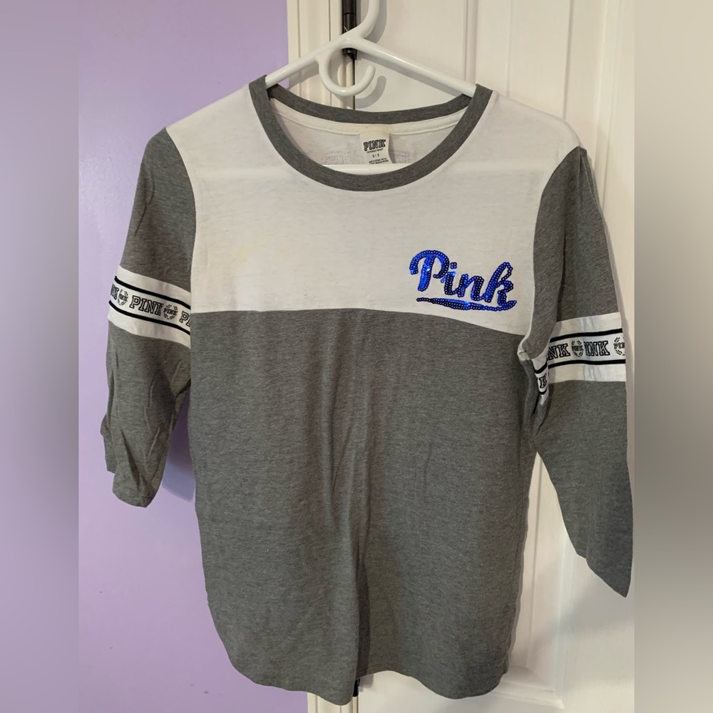 Pink Victoria’s Secret, grey with blue sequins shirt in size small.